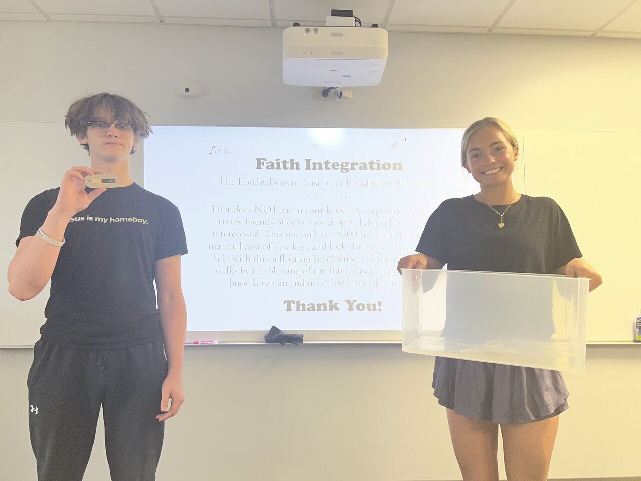 Students demonstrating a floating keychain design