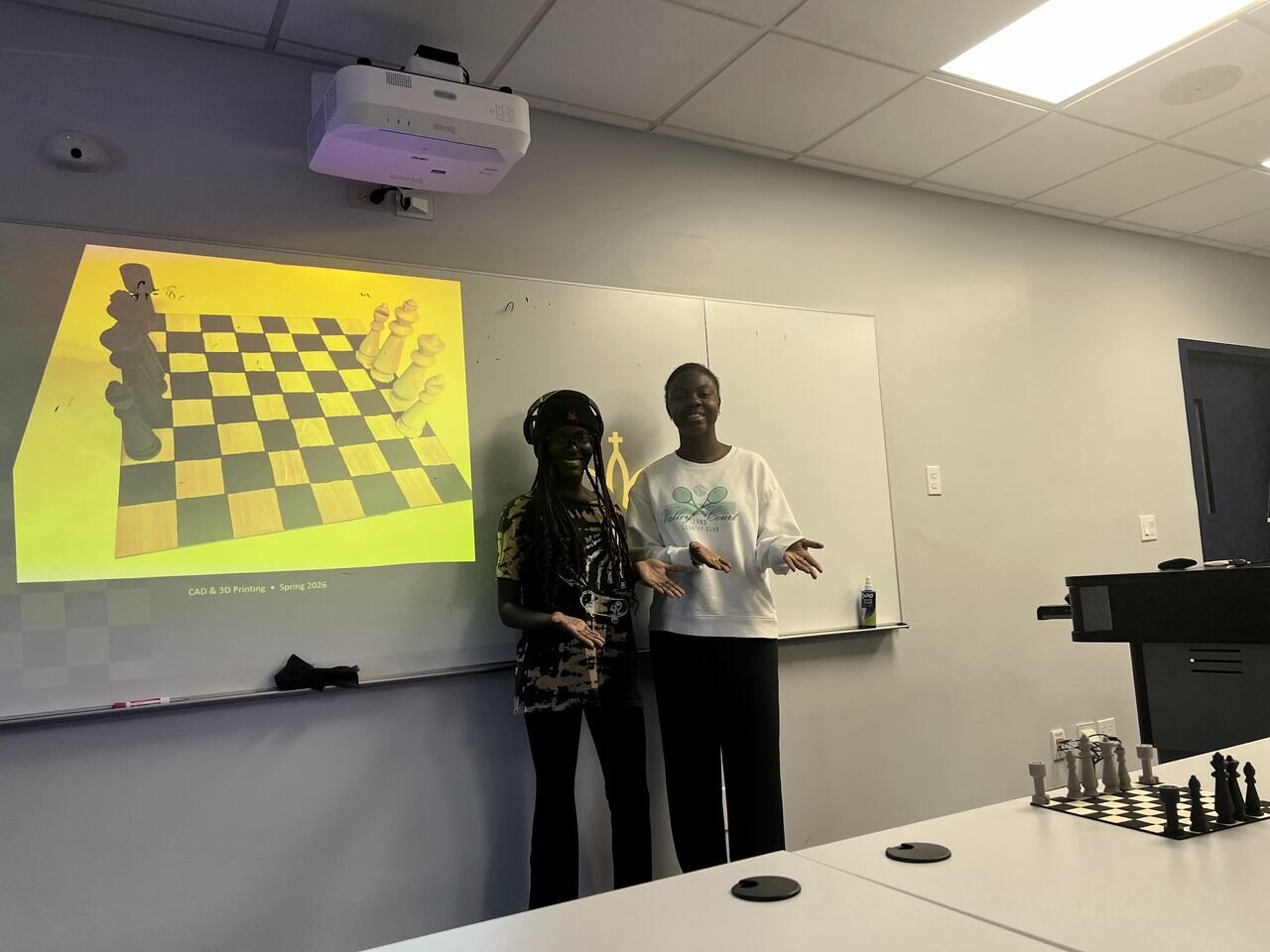Students presenting their chess set design and final prototype